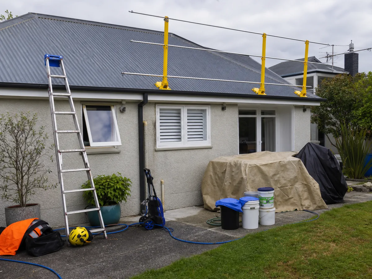 Roof painting access equipment and coating materials prepared safely
