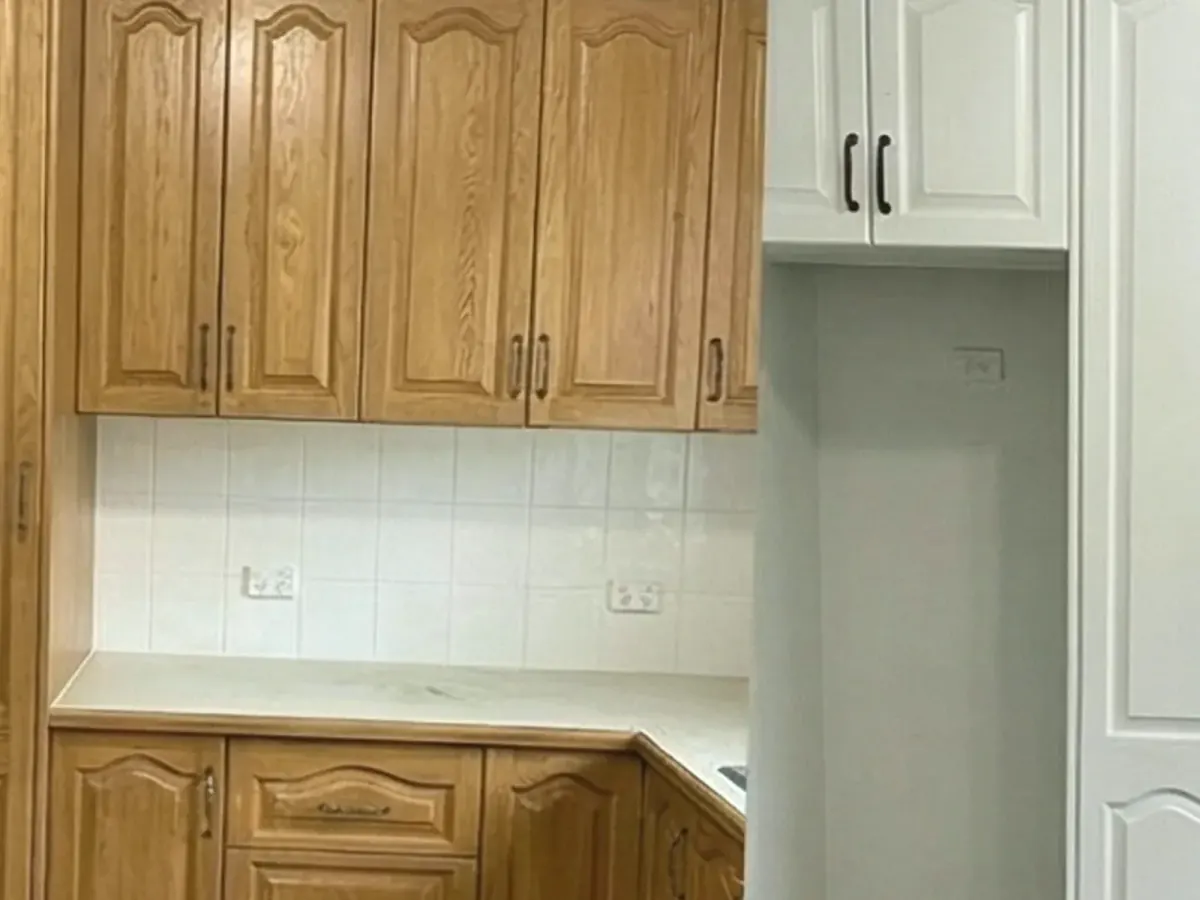Kitchen interior before and after cabinet and wall painting in South Auckland home, Tomar Contracting Auckland